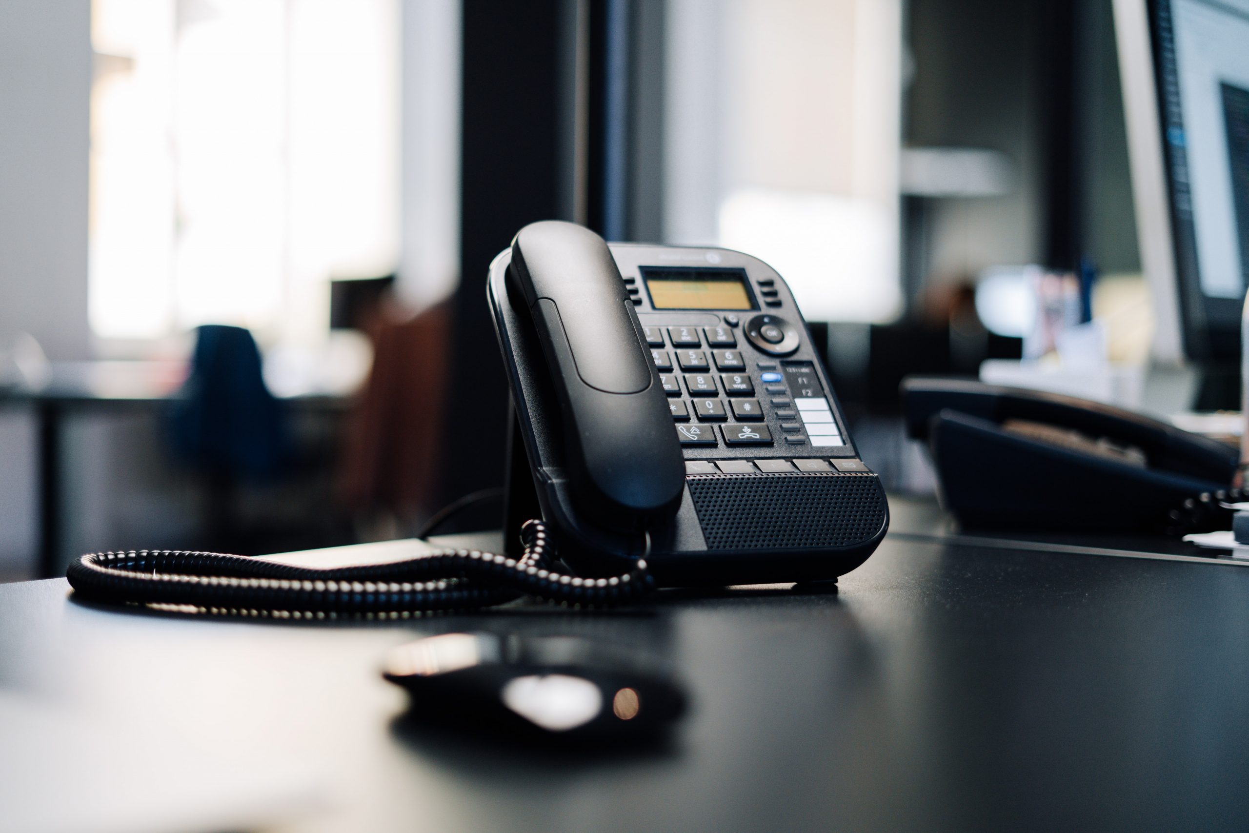 answering service pricing on a business phone