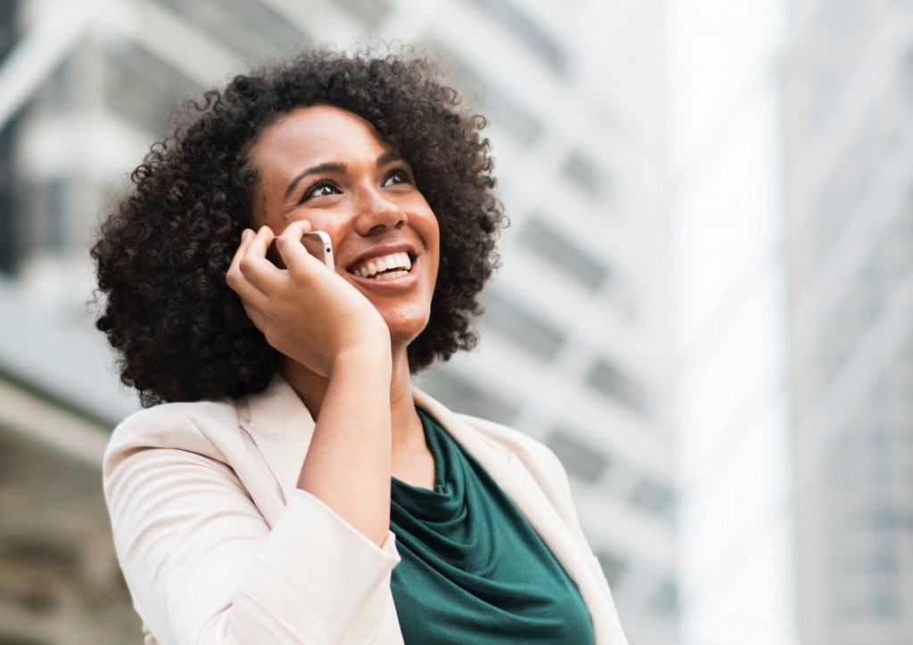 Young girl talking on cell phones