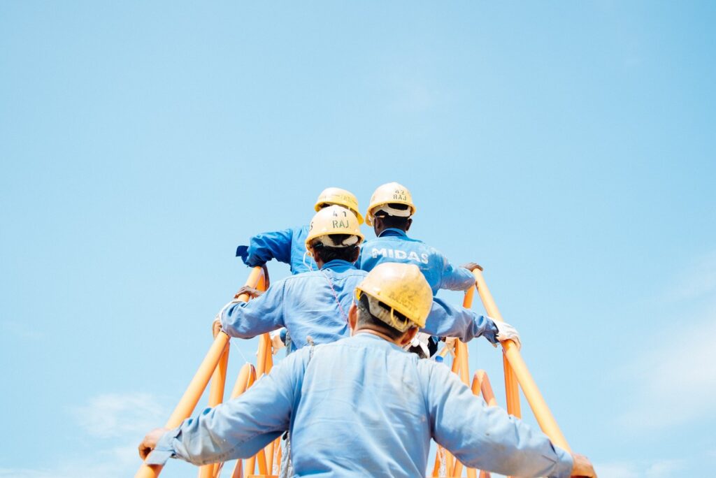 image of contractors in hardhats going to work with the help of a contractor answering service
