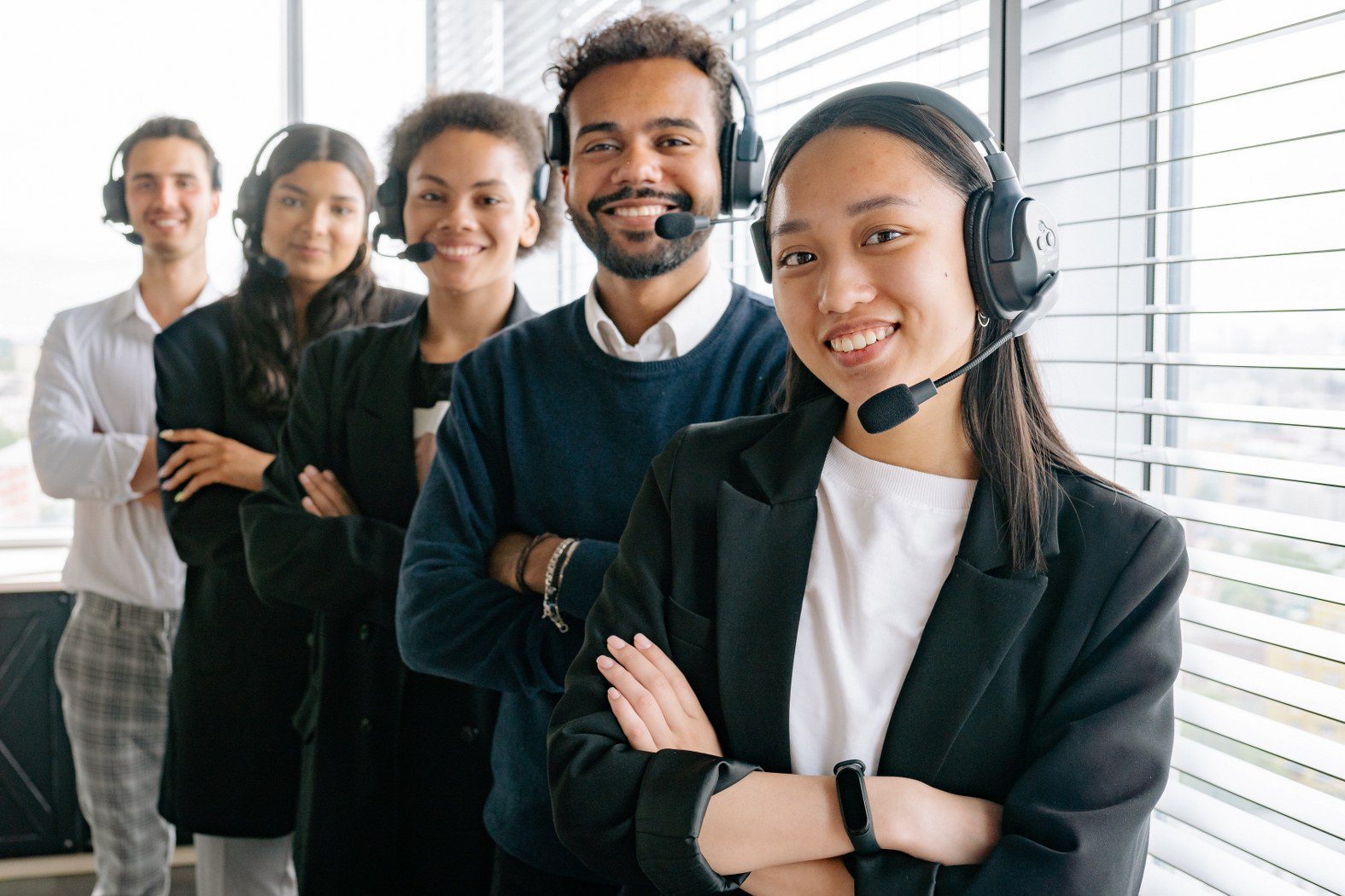 image of a group of live receptionists as part of a 24/7 legal answering service