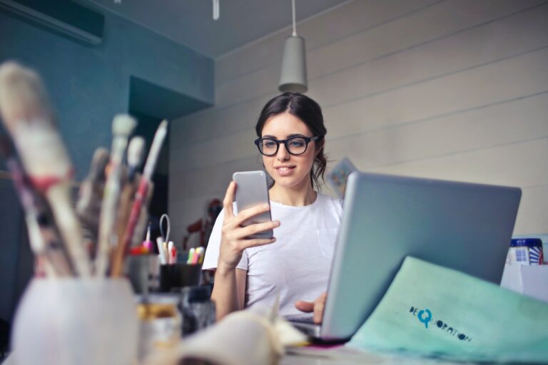 image of someone checking their phone representing an answering service for event registration